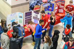 UW students attend the spring semester Student Organization Fair at the Kohl Center at the University of Wisconsin-Madison on Jan. 30, 2014. The fair is a promotional opportunity for student organizations to introduce themselves to the student attendees. (Photo by Bryce Richter / UW-Madison)