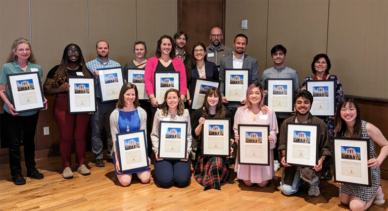 Winners of the 2023 Advising, Career Services & Learning Support Awards gather with their framed awards.